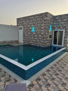 Foto sihtkohas Al Rahba asuva majutusasutuse Luxury Farmhouse Near Yas Island With Swimming Pool, BBQ Area & Majlis galeriist