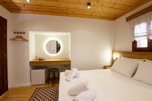 Postel nebo postele na pokoji v ubytování Guesthouse Lani