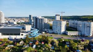 an aerial view of a city with buildings and a highway at Apartment 19 - Aquapark Reda in Reda