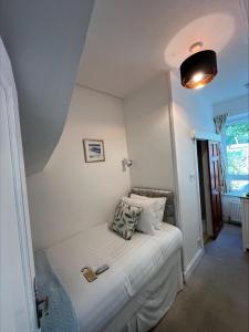 Voodi või voodid majutusasutuse Glenroy Guest House toas