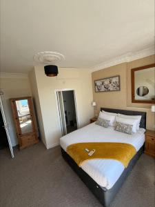 Voodi või voodid majutusasutuse Glenroy Guest House toas