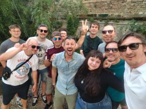 un grupo de personas posando para una foto en Up Hostel, en Belgrado