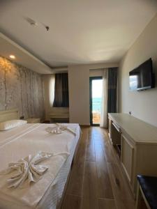 TV a/nebo společenská místnost v ubytování Hotel Mutlu