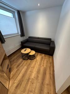 Ruang duduk di Deluxe Apart Bader