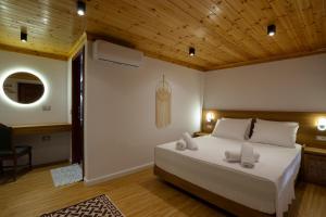 Postel nebo postele na pokoji v ubytování Guesthouse Lani