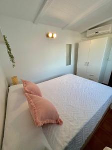 Postel nebo postele na pokoji v ubytování Casita Los Pinos + 19 fotografií