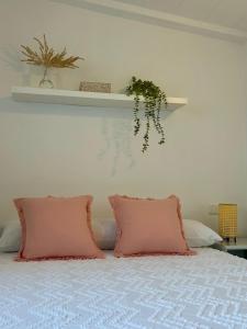 Postel nebo postele na pokoji v ubytování Casita Los Pinos