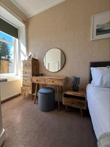 Voodi või voodid majutusasutuse Glenroy Guest House toas