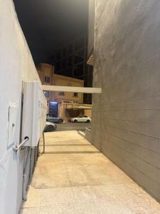 a hallway in a building with a parking lot at نزل براندي in Quai