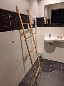Koupelna v ubytování LE PATIO + 37 fotografií