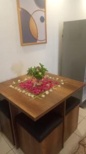 a table with a flower arrangement on top of it at Villa Silia in Sharm El Sheikh
