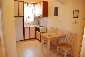 Kuchyň nebo kuchyňský kout v ubytování Hotel Marilen
