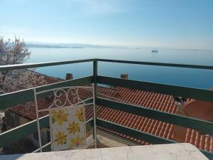 a balcony with a view of the water at Apartment Trieste Casa Vacanze NATASCIA in Trieste