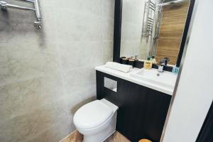 Ένα μπάνιο στο No46 Stylish City Studio Apartment, By DerBnB