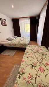 Llit o llits en una habitació de Gasthof Durigon