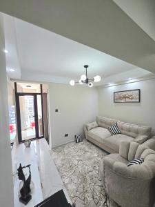 Χώρος καθιστικού στο Luxe Modern Homes