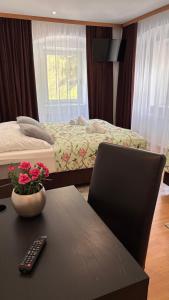Llit o llits en una habitació de Gasthof Durigon