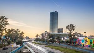 a view of a city with a tall building at Pousada elisa in Cordoba