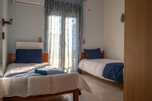 Ένα ή περισσότερα κρεβάτια σε δωμάτιο στο Vista Costa villa