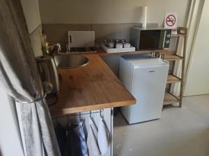 Kuchyň nebo kuchyňský kout v ubytování Mossienes Cottage + 2 fotografie