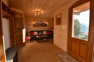 Postel nebo postele na pokoji v ubytování CHALET SERRE CHEVALIER AVEC VUE EXCEPTIONNELLE