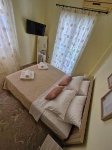 Postel nebo postele na pokoji v ubytování Vivari apartment