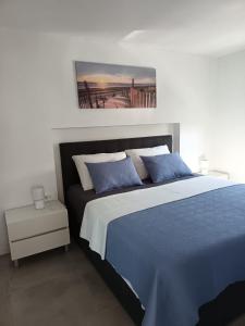 Ένα ή περισσότερα κρεβάτια σε δωμάτιο στο Zaton Apartments