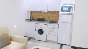 Η κουζίνα ή μικρή κουζίνα στο Luxury Studio