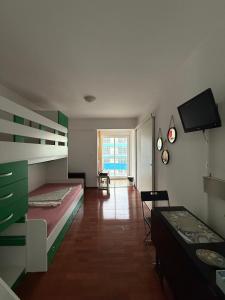 Katil atau katil-katil dalam bilik di Apartament Sofia Saturn Mangalia