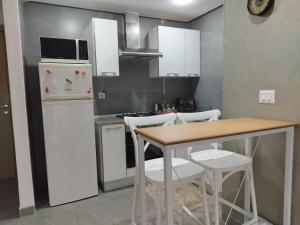 Kuchyň nebo kuchyňský kout v ubytování Appartement Cosy