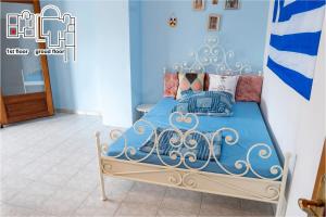 Postel nebo postele na pokoji v ubytování Great Villa Philipi