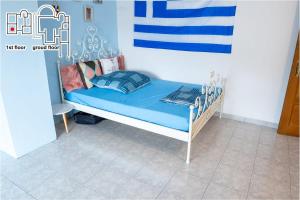 Postel nebo postele na pokoji v ubytování Great Villa Philipi
