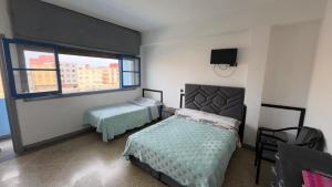 Beni EnzarHotel Quatre Saison的相册照片