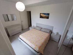 Postel nebo postele na pokoji v ubytování Appartamento Mi & Mi