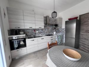 Kuchyň nebo kuchyňský kout v ubytování Andrea's Home