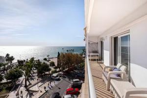a balcony of a building with a view of the ocean at RentitSpain - Nerja - Apartamentos Vistas Únicas al Mar Mediterráneo in Nerja