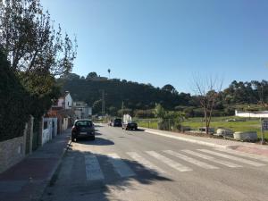 a street with cars driving down the road at GELVESTURIST 2 Free parking in Gelves