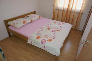 Ein Bett oder Betten in einem Zimmer der Unterkunft Croatian Home Apartments
