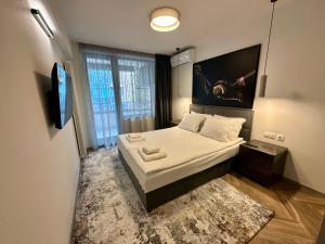 Llit o llits en una habitació de Milea apartments