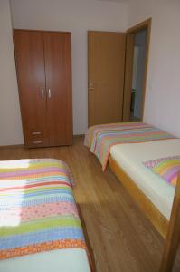 Ein Bett oder Betten in einem Zimmer der Unterkunft Croatian Home Apartments