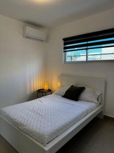 Postel nebo postele na pokoji v ubytování Punta Cana Summer retreat