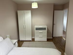 Postel nebo postele na pokoji v ubytování Chalet 1