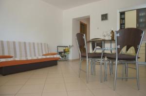 Ein Sitzbereich in der Unterkunft Croatian Home Apartments