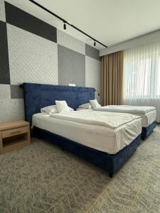 Posteľ alebo postele v izbe v ubytovaní Grape Town Hotel - Park79