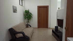 TV a/nebo společenská místnost v ubytování SW1 - Cosy Three bedroom apartment in Xghajra