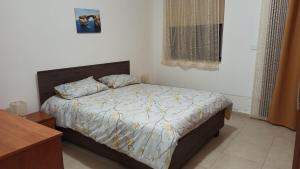 Postel nebo postele na pokoji v ubytování SW1 - Cosy Three bedroom apartment in Xghajra
