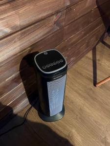 a trash can sitting on the floor next to a wall at Modern cabin in amazing hiking area! in Gol +24 photos