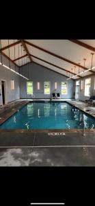 a large swimming pool in a large building at Sugar Ski & Country Club in Sugar Mountain