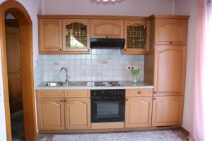 Kuchyň nebo kuchyňský kout v ubytování Gästehaus Maier Faaker See