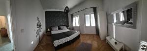 Posteľ alebo postele v izbe v ubytovaní Zara Apartment